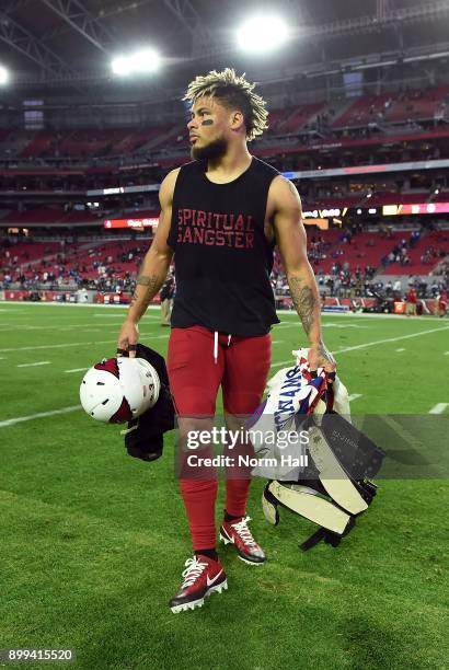 Tyrann Mathieu of the Arizona Cardinals walks off the field after a game against the New York Giants at University of Phoenix Stadium on December 24,...