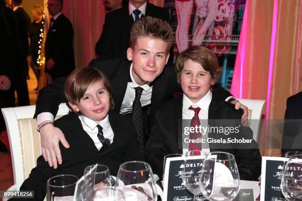 Quinn Kelly Stone, Roan Joseph Bronstein and his brother Laird Vonne Stone, sons of Sharon Stone during the charity gala benefiting 'Planet Hope'...