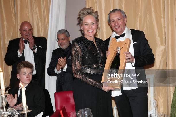 Son Roan Joseph Bronstein, Sharon Stone and Georg Walter, director of the tourist office, with present during the charity gala benefiting 'Planet...