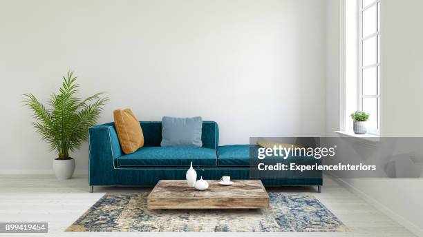 pastel colored sofa with blank wall template - blue room stock pictures, royalty-free photos & images