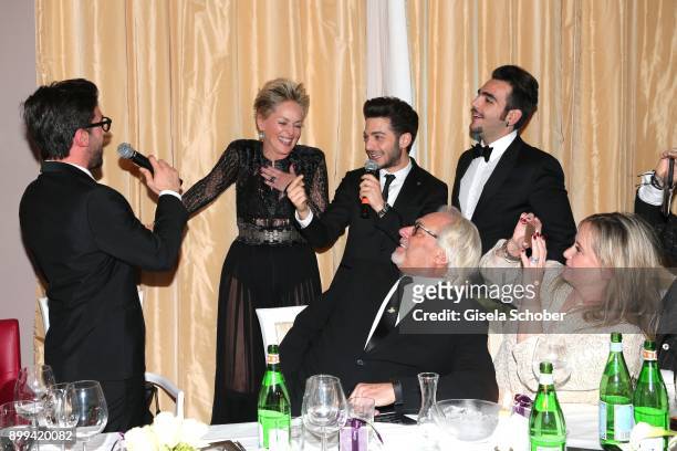 Sharon Stone and singer of "Il Volo", Piero Barone , Gianluca Ginoble and Ignazio Boschetto during the charity gala benefiting 'Planet Hope'...