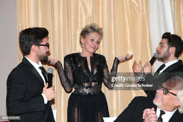 Sharon Stone and singer of "Il Volo", Piero Barone , Gianluca Ginoble during the charity gala benefiting 'Planet Hope' foundation at Kempinski Grand...