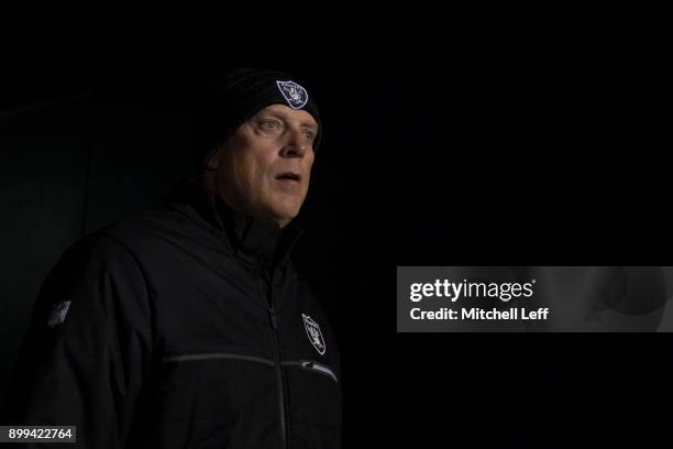 Head coach Jack Del Rio of the Oakland Raiders walks on the field prior to the game against the Philadelphia Eagles at Lincoln Financial Field on...