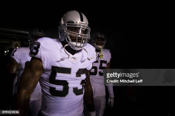 NaVorro Bowman of the Oakland Raiders walks onto the field prior to the game against the Philadelphia Eagles at Lincoln Financial Field on December...
