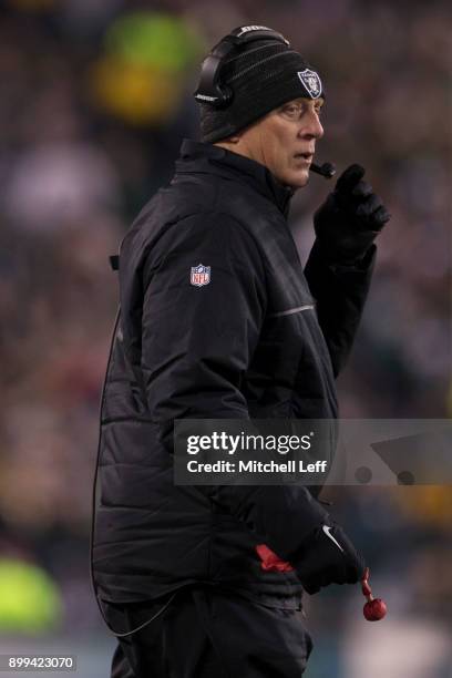 Head coach Jack Del Rio of the Oakland Raiders looks on against the Philadelphia Eagles at Lincoln Financial Field on December 25, 2017 in...