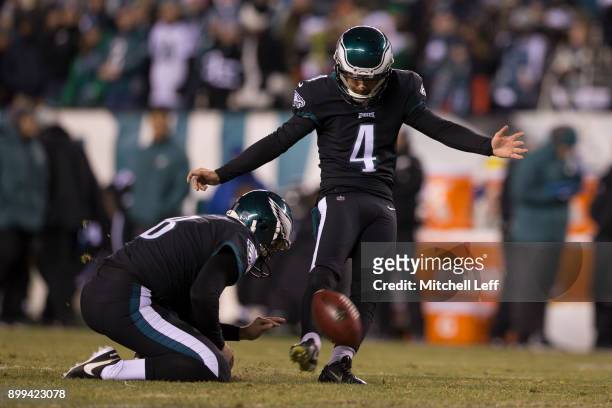 Jake Elliott of the Philadelphia Eagles kicks and extra point against the Oakland Raiders at Lincoln Financial Field on December 25, 2017 in...