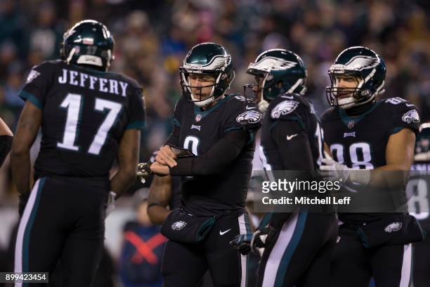 Nick Foles of the Philadelphia Eagles calls a play for Alshon Jeffery, Nelson Agholor, and Trey Burton against the Oakland Raiders at Lincoln...
