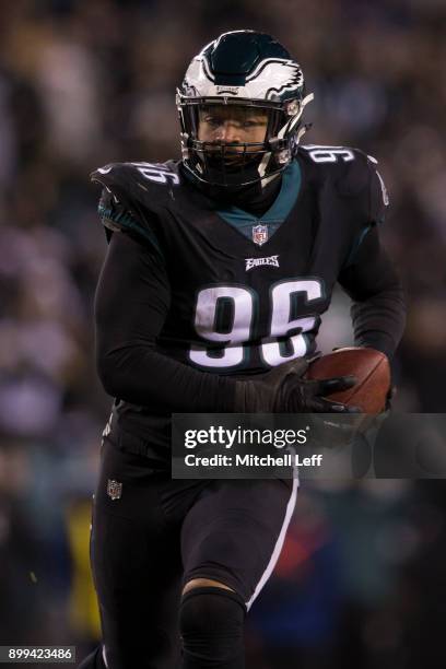 Derek Barnett of the Philadelphia Eagles runs with the ball against the Oakland Raiders at Lincoln Financial Field on December 25, 2017 in...