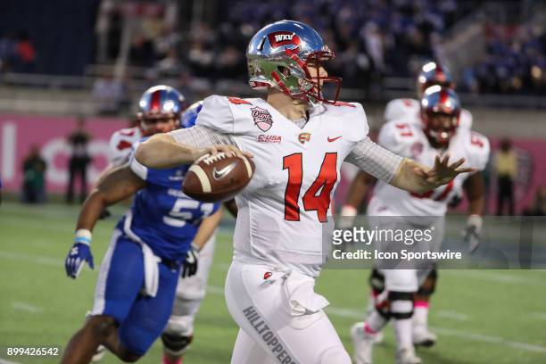 Western Kentucky Hilltoppers quarterback Mike White passes the ball during the Cure Bowl between the Western Kentucky Hilltoppers and the Georgia...