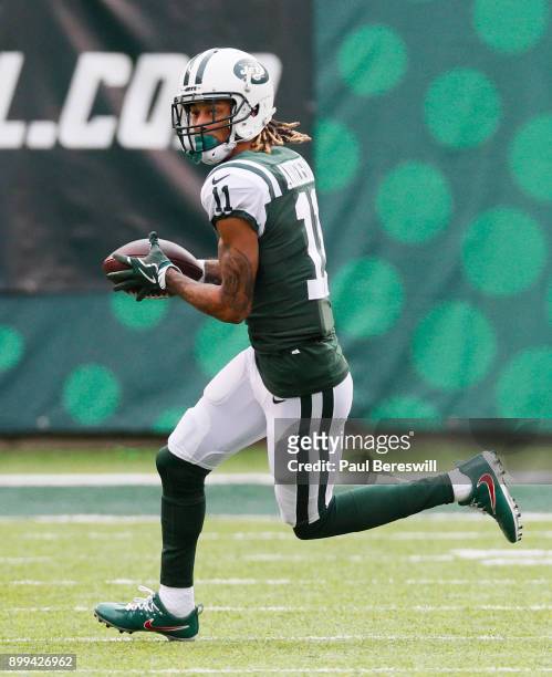 Robby Anderson of the New York Jets runs with the ball in an NFL football game against the Los Angeles Chargers on December 24, 2017 at MetLife...