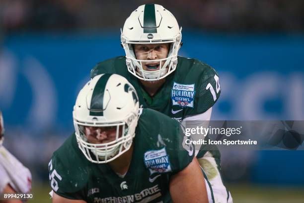 Brian Lewerke of the Michigan State Spartans in the game between the Washington State Cougars and the Michigan State Spartans in the Holiday Bowl on...