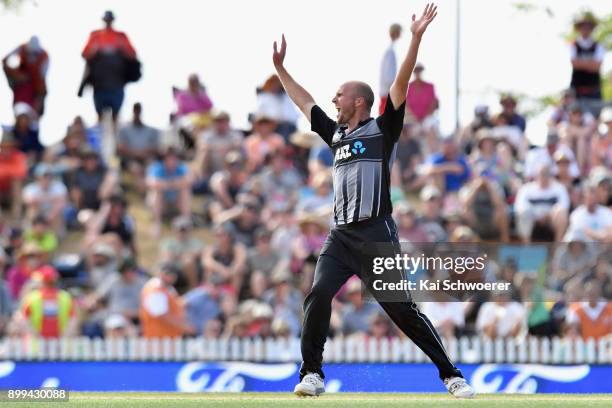 Seth Rance of New Zealand celebrates after taking the final wicket to give New Zealand victory over the West Indies during game one of the Twenty20...