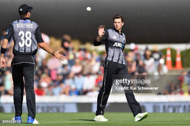 Mitchell Santner of New Zealand looks on during game one of the Twenty20 series between New Zealand and the West Indies at Saxton Field on December...