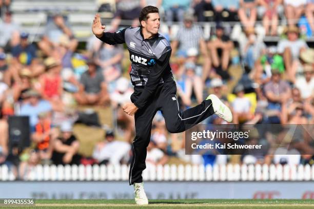 Mitchell Santner of New Zealand bowls during game one of the Twenty20 series between New Zealand and the West Indies at Saxton Field on December 29,...