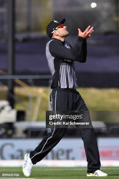 Tom Bruce of New Zealand takes a catch to dismiss Jerome Taylor of the West Indies during game one of the Twenty20 series between New Zealand and the...