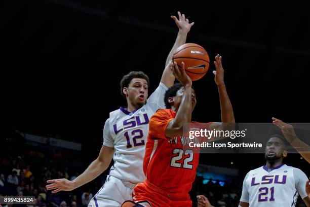 Sam Houston State Bearkats guard Marcus Harris shoots against LSU Tigers guard Marshall Graves on December 19, 2017 at Pete Maravich Assembly Center...