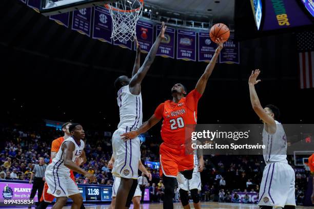 Sam Houston State Bearkats guard Jamal Williams shoots a hook shot against LSU Tigers forward Duop Reath on December 19, 2017 at Pete Maravich...