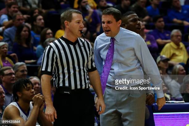 Tigers head coach Will Wade agrees with the ref on a play against Sam Houston State Bearkats on December 19, 2017 at Pete Maravich Assembly Center in...