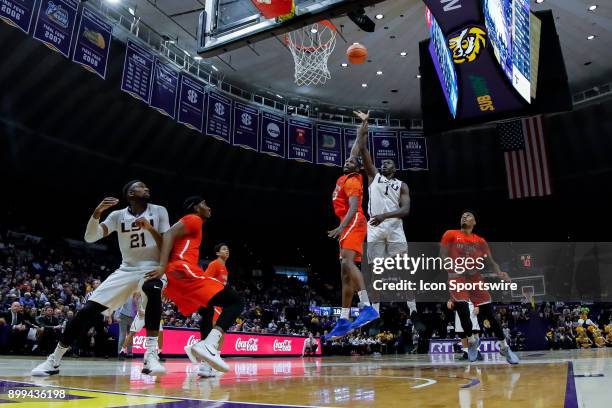 Tigers forward Duop Reath shoots a jump shot against Sam Houston State Bearkats forward Christopher Galbreath Jr. On December 19, 2017 at Pete...