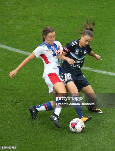 Lia Privitelli of the Victory contests the ball during the round nine W-League match between the Melbourne Victory and the Newcastle Jets at AAMI...