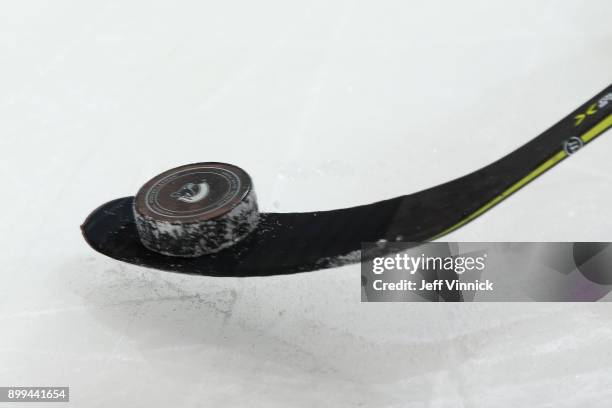 Player handles the puck with his stick during the NHL game between the Vancouver Canucks and the Carolina Hurricanes at Rogers Arena December 5, 2017...