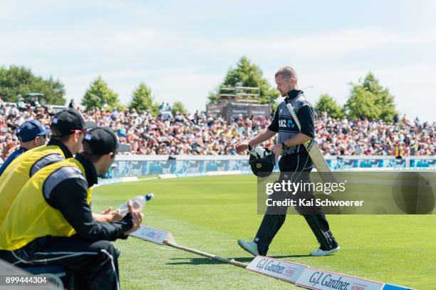 Colin Munro of New Zealand looks dejected after being dismissed by Ashley Nurse of the West Indies during game one of the Twenty20 series between New...