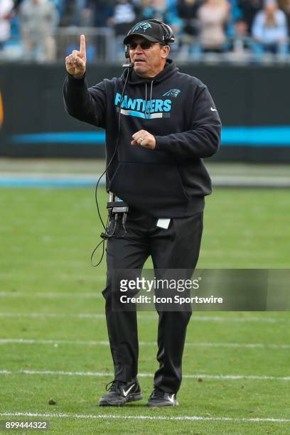Carolina Panthers head coach Ron Rivera signals to his offense after a first and goal during the second half between the Tampa Bay Buccaneers and the...