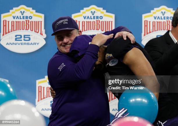 Head coach Gary Patterson of the TCU Horned Frogs celebrates with Kenny Hill after the Valero Alamo Bowl game against the Stanford Cardinal at the...