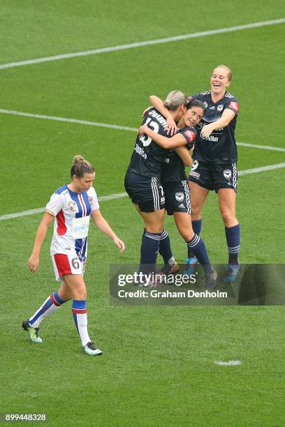 Kyra Cooney-Cross of the Victory celebrates her goal with teammates during the round nine W-League match between the Melbourne Victory and the...