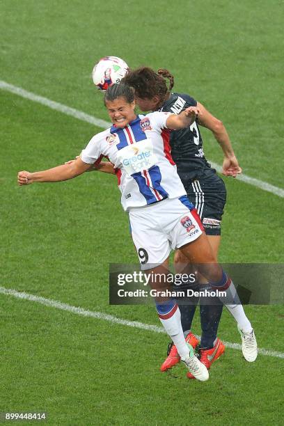 Katie Stengel of the Jets heads the ball during the round nine W-League match between the Melbourne Victory and the Newcastle Jets at AAMI Park on...