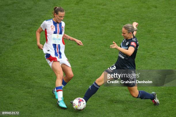 Laura Spiranovic of the Victory tackles her opponent during the round nine W-League match between the Melbourne Victory and the Newcastle Jets at...