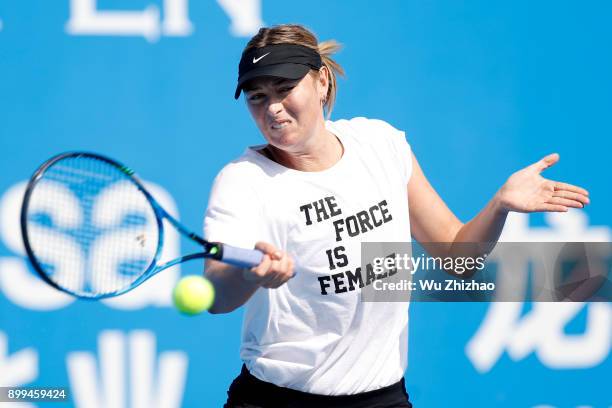 Maria Sharapova of Russia attends a training session ahead of the 2018 WTA Shenzhen Open on December 29, 2017 in Shenzhen, China.