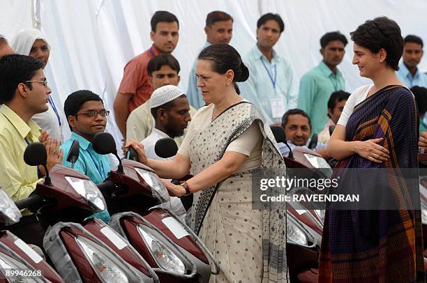 Chairperson of India's United Progressive Alliance Government and Congress Party President Sonia Gandhi and her daughter Priyanka Gandhi arrive to...