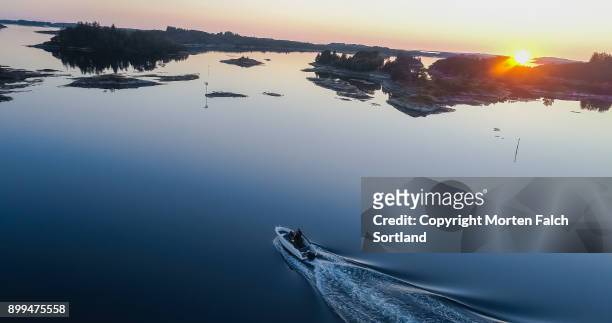 motorboat on the fjord - motorboat stock pictures, royalty-free photos & images