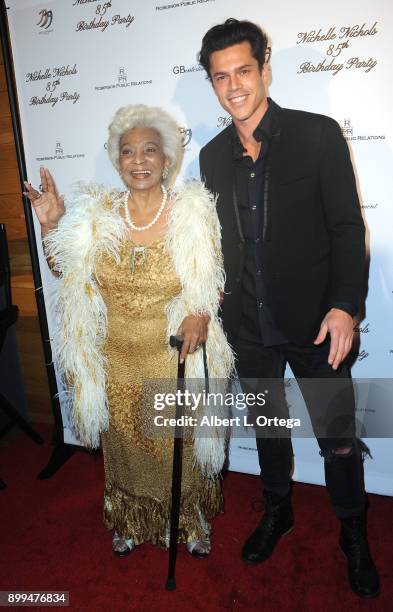 Actress Nichelle Nichols and actor Tyler Tuck arrive for Nichelle Nichols' 85th Birthday Celebration held at La Piazza/The Grove on December 28, 2017...