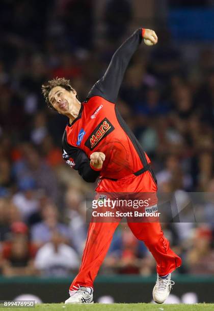 Brad Hogg of the Renegades bowls during the Big Bash League match between the Melbourne Renegades and the Perth Scorchers at Etihad Stadium on...