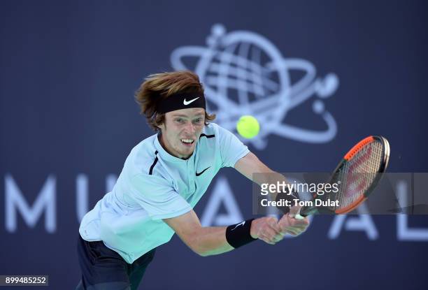 Andrey Rublev of Russia plays a backhand during his 5th place play-off match against Pablo Carreno Busta of Spain on day two of the Mubadala World...
