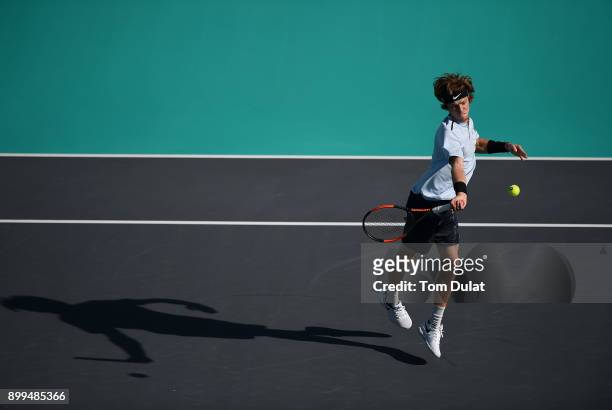Andrey Rublev of Russia plays a forehand during his 5th place play-off match against Pablo Carreno Busta of Spain on day two of the Mubadala World...