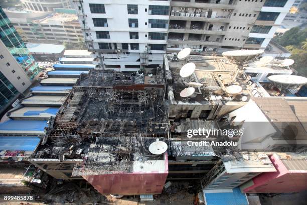 General view of a burning building after a fire broke out at a rooftop restaurant in Mumbai, India on December 29, 2017. At least 15 people were...