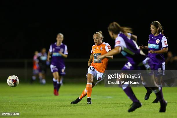 Tameka Butt of the Roar crosses the ball during the round nine W-League match between the Perth Glory and Brisbane Roar at Dorrien Gardens on...