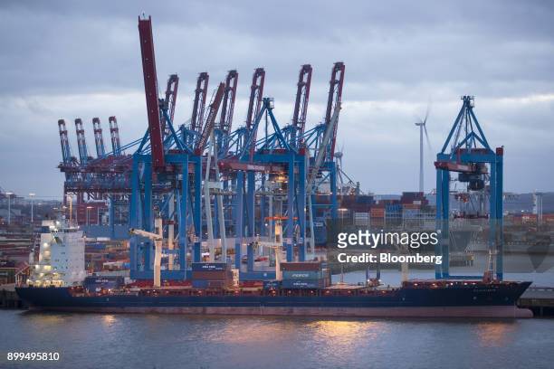 The Vladimir shipping container vessel is loaded at the Hamburger Hafen und Logistik AG Container Terminal Burchardkai in the Port of Hamburg in...
