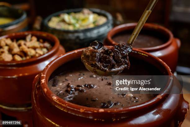 delicious brazilian feijoada - black beans stock pictures, royalty-free photos & images