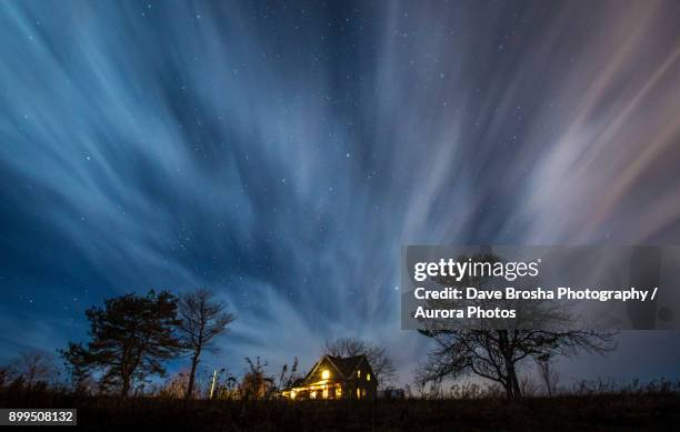 dramatic night exposure over country farmhouse - farmhouse stock pictures, royalty-free photos & images