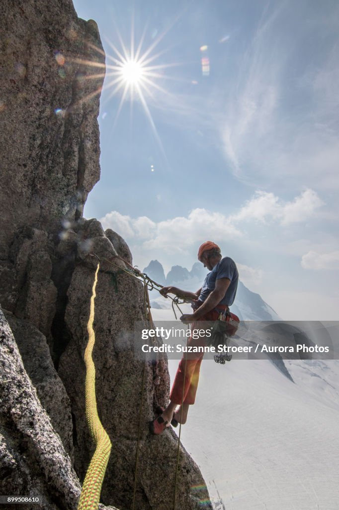 Man rock climbing at Surfs Up in Bugaboo Mountains, British Columbia, Canada