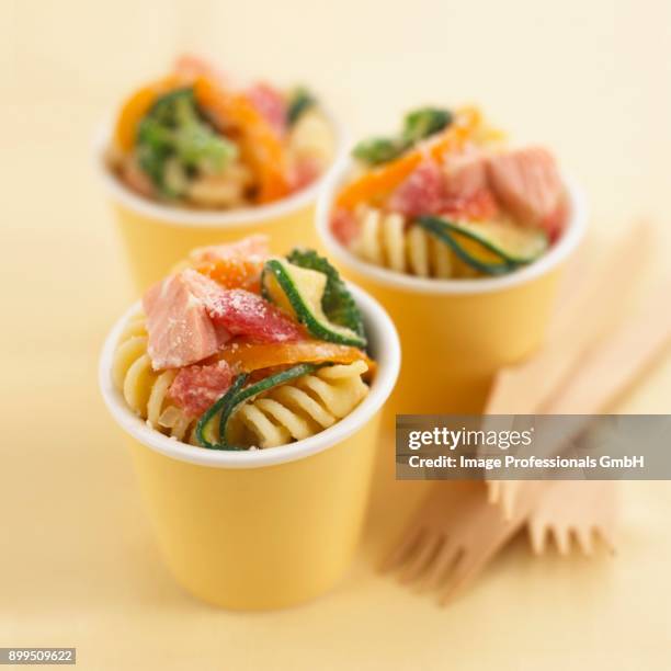 pasta salad with salmon and vegetables - zucchine stock pictures, royalty-free photos & images