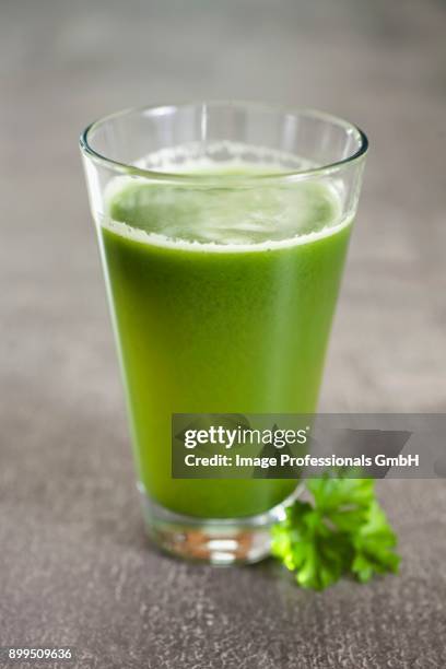 a cocktail made out of fresh vegetable and fruit - juice / apple, salad, cucumber, celery - celery sticks stock pictures, royalty-free photos & images