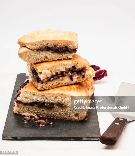 calzone with radicchio and cheese - witloof chicory stock pictures, royalty-free photos & images