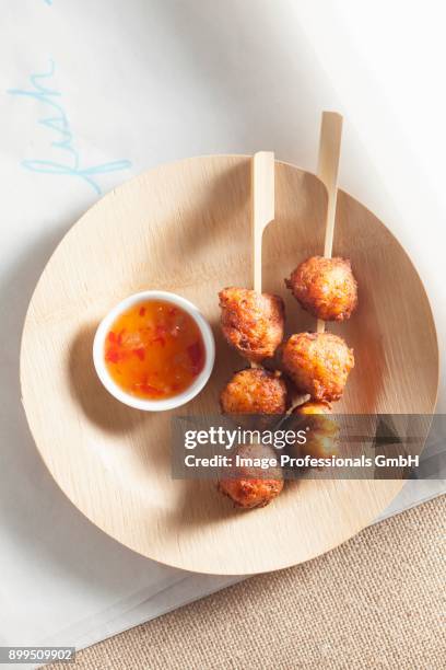 fish balls with sweet and sour sauce - fishball stock-fotos und bilder