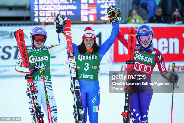 Viktoria Rebensburg of Germany takes 2nd place, Federica Brignone of Italy takes 1st place, Mikaela Shiffrin of USA takes 3rd place during the Audi...