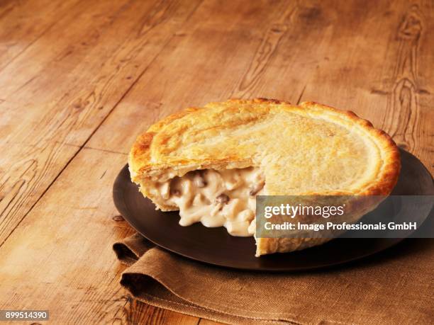 chicken and mushroom pie, sliced - mushroom pie stock pictures, royalty-free photos & images